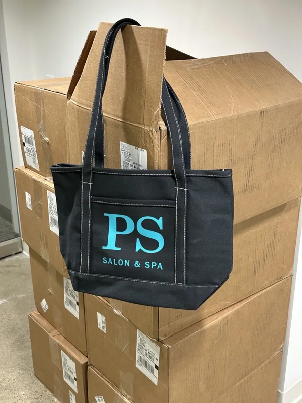A PS Salon & Spa tote prepared with salon supplies